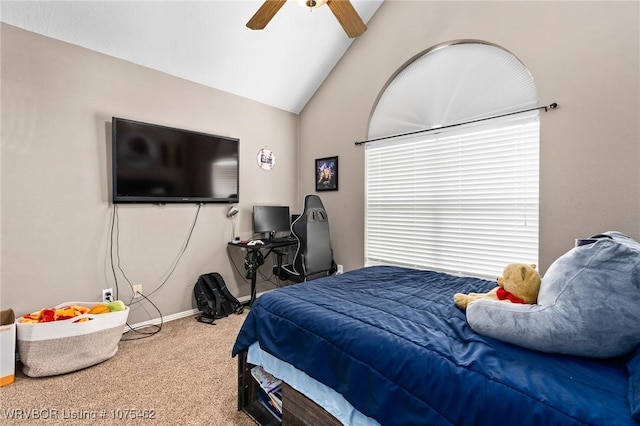 carpeted bedroom with vaulted ceiling and ceiling fan