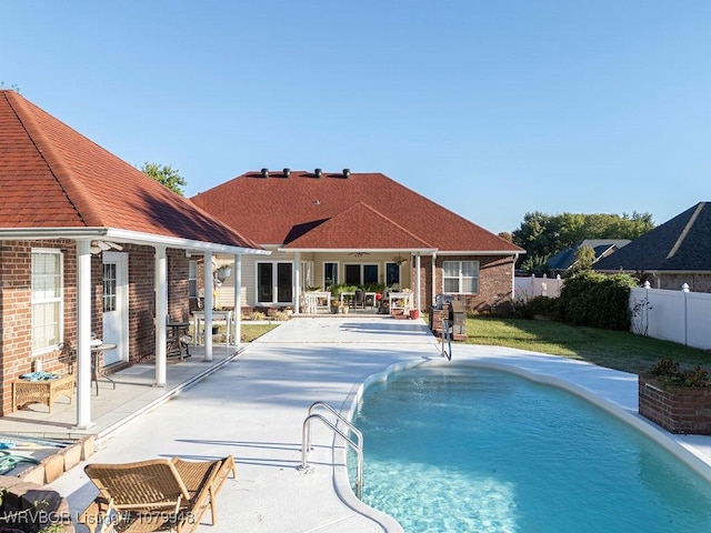 6408 Southfield Dr, Fort Smith, AR 72916 - view of swimming pool with a fenced in pool, a fenced backyard, a ceiling fan, a yard, and a patio area