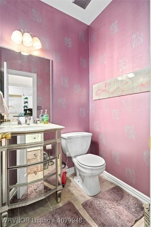 6408 Southfield Dr, Fort Smith, AR 72916 - bathroom with baseboards, toilet, and vanity