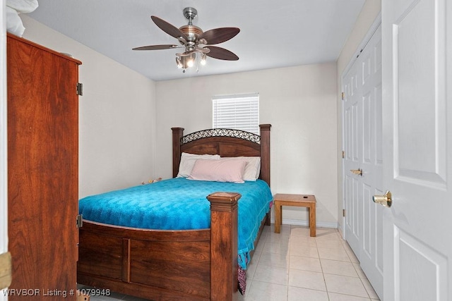 6408 Southfield Dr, Fort Smith, AR 72916 - bedroom with tile patterned floors, a closet, ceiling fan, and baseboards