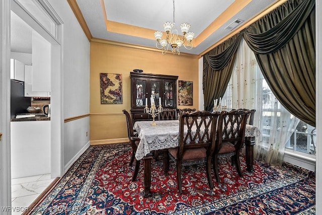 6408 Southfield Dr, Fort Smith, AR 72916 - dining room featuring a notable chandelier, a raised ceiling, marble finish floor, baseboards, and visible vents