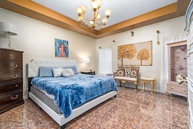 6408 Southfield Dr, Fort Smith, AR 72916 - tiled bedroom with a raised ceiling, baseboards, and a chandelier