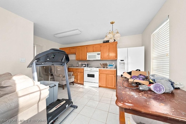 6408 Southfield Dr, Fort Smith, AR 72916 - kitchen with white appliances, light countertops, and light tile patterned floors