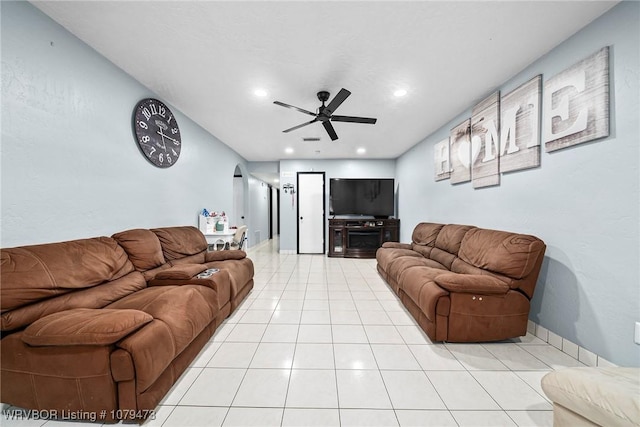 living room featuring recessed lighting, baseboards, light tile patterned flooring, and a ceiling fan