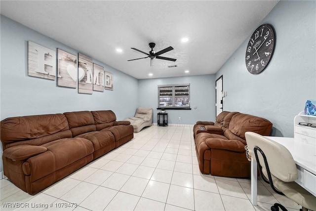 living area with light tile patterned floors, recessed lighting, and ceiling fan