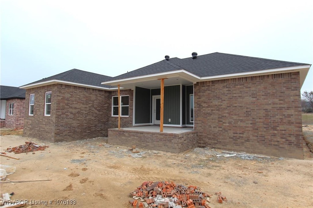 rear view of property with a patio