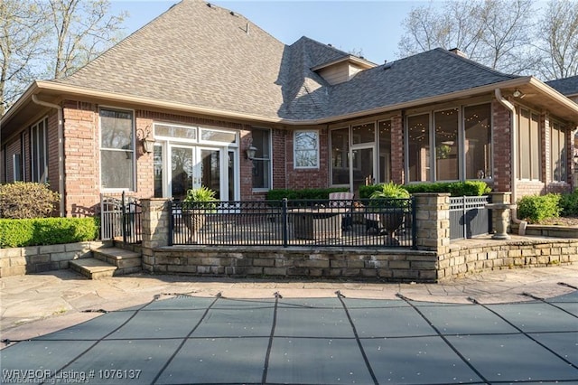 10408 Innsbruck Ct, Fort Smith, AR 72908 - rear view of house with a patio and a covered pool