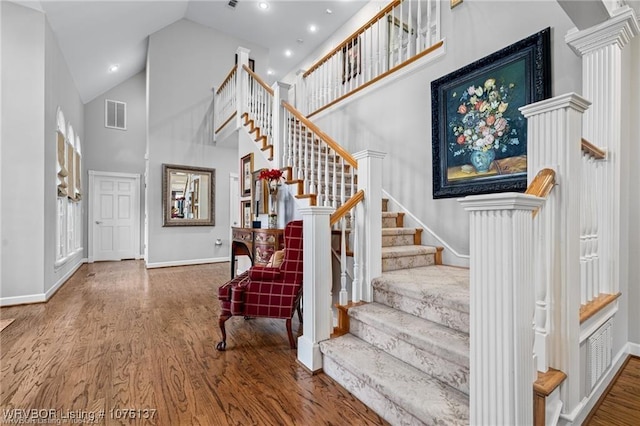 10408 Innsbruck Ct, Fort Smith, AR 72908 - foyer entrance with high vaulted ceiling and hardwood / wood-style flooring