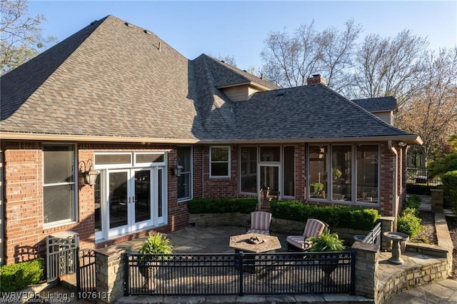 10408 Innsbruck Ct, Fort Smith, AR 72908 - rear view of property with a patio area, an outdoor fire pit, and french doors