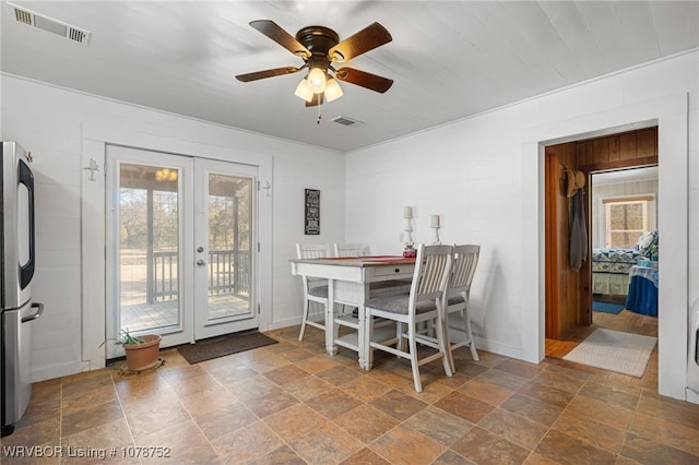 dining area featuring french doors and ceiling fan