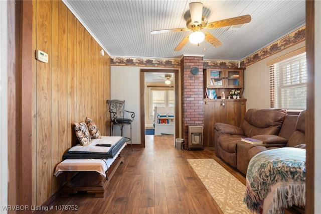 living room with hardwood / wood-style floors, plenty of natural light, and ceiling fan