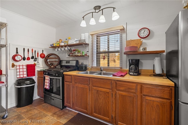 kitchen with appliances with stainless steel finishes and sink