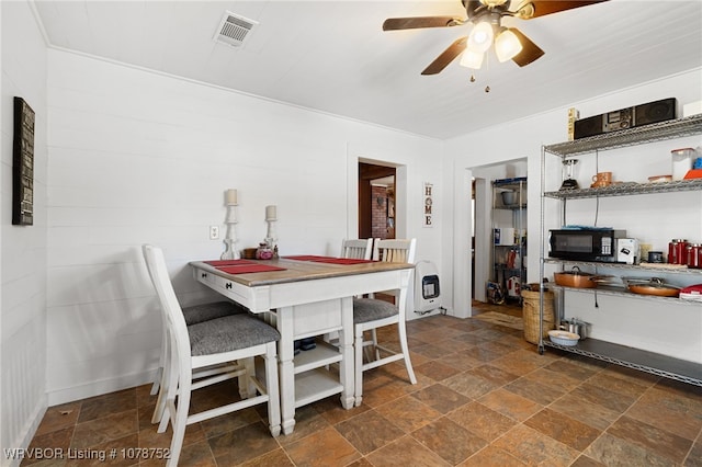 dining room with ceiling fan