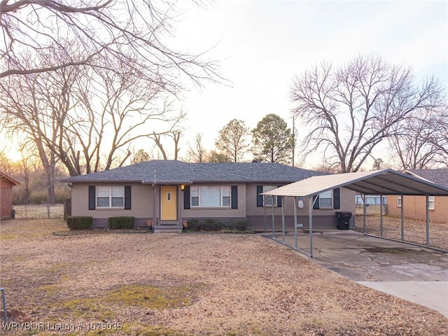 view of front facade with a carport