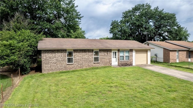 105 N Circle B, Roland, OK 74954 - single story home with concrete driveway, brick siding, and an attached garage