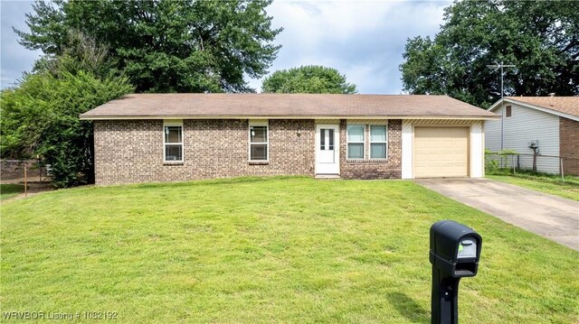 105 N Circle B, Roland, OK 74954 - single story home with driveway, an attached garage, and brick siding