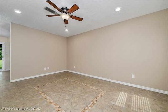 105 N Circle B, Roland, OK 74954 - unfurnished room featuring a ceiling fan, tile patterned floors, and recessed lighting