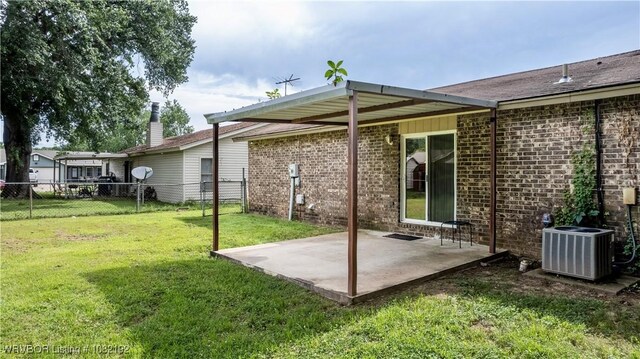 105 N Circle B, Roland, OK 74954 - back of house with a patio area and brick siding