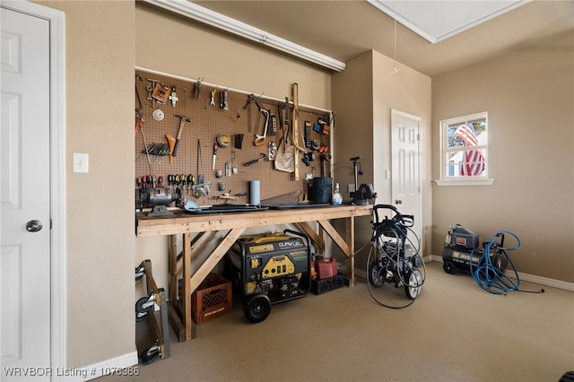 garage featuring a workshop area