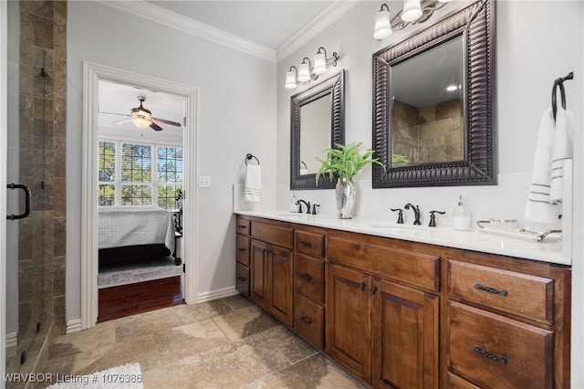 bathroom with ceiling fan, a shower with shower door, ornamental molding, and vanity