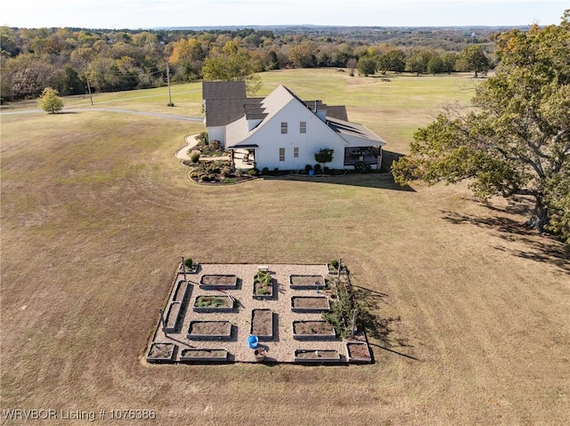 birds eye view of property featuring a rural view