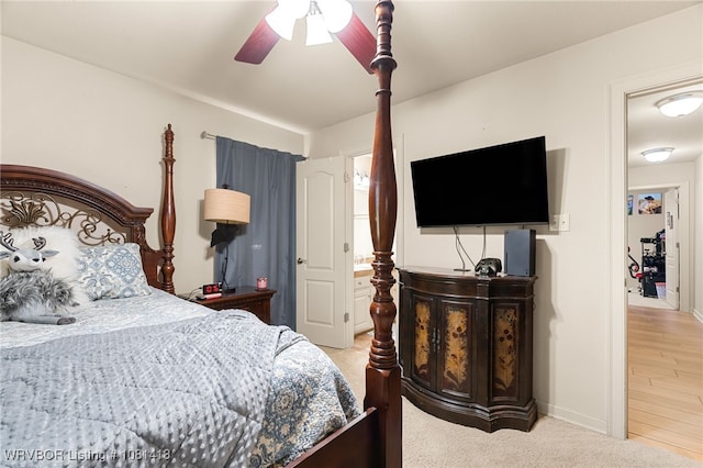 2110 Parkway Cir, Van Buren, AR 72956 - carpeted bedroom featuring ceiling fan and baseboards