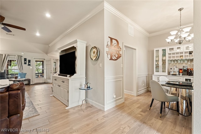 2110 Parkway Cir, Van Buren, AR 72956 - dining area with ceiling fan, a chandelier, crown molding, light wood-type flooring, and recessed lighting