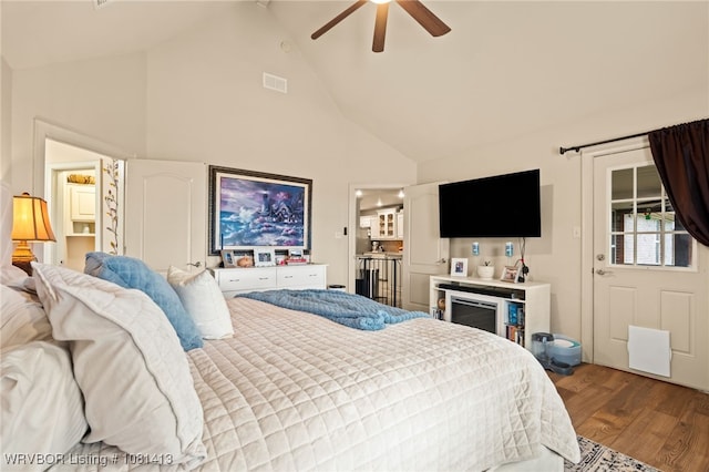 2110 Parkway Cir, Van Buren, AR 72956 - bedroom with high vaulted ceiling, wood finished floors, and ceiling fan