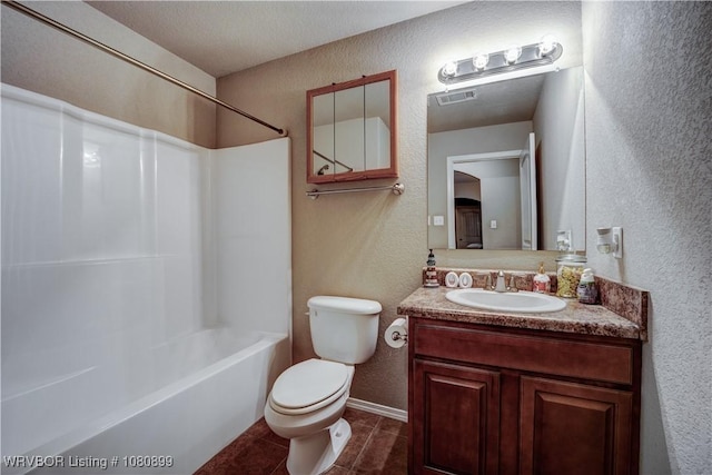 2005 Scarlet Oak Dr, Van Buren, AR 72956 - bathroom with a textured wall, toilet, tile patterned floors, tub / shower combination, and vanity