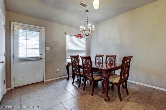 2005 Scarlet Oak Dr, Van Buren, AR 72956 - dining room featuring healthy amount of natural light, a chandelier, baseboards, and light tile patterned floors
