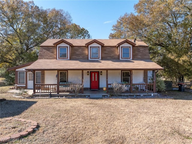 country-style home with covered porch