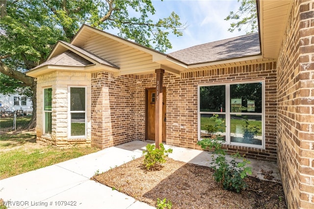 3115 Spradling Ave, Fort Smith, AR 72904 - view of exterior entry featuring brick siding and roof with shingles
