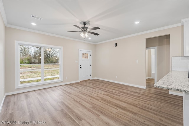 3115 Spradling Ave, Fort Smith, AR 72904 - unfurnished living room featuring ceiling fan, light wood-type flooring, recessed lighting, and ornamental molding