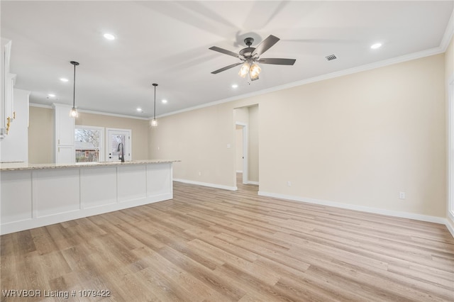 3115 Spradling Ave, Fort Smith, AR 72904 - unfurnished living room featuring light wood-style floors, ornamental molding, recessed lighting, and a ceiling fan