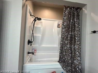 bathroom featuring tub / shower combination