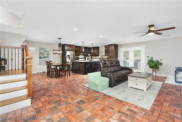 298 Bayou Rd, Fort Gibson, OK 74434 - living area with recessed lighting, brick floor, stairway, and ceiling fan