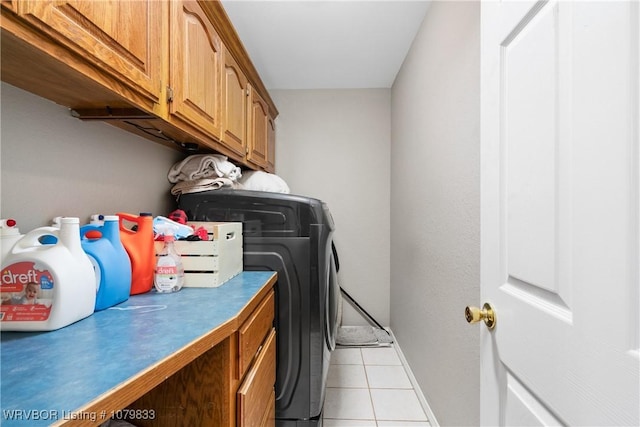 298 Bayou Rd, Fort Gibson, OK 74434 - laundry room with cabinet space, tile patterned flooring, and washer and dryer