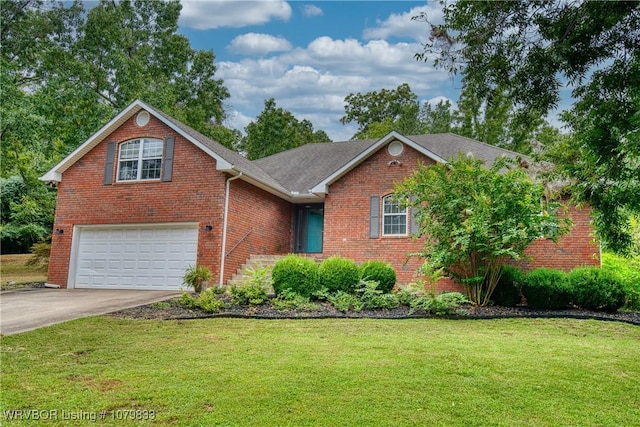 298 Bayou Rd, Fort Gibson, OK 74434 - single story home featuring an attached garage, driveway, a front lawn, brick siding, and a shingled roof
