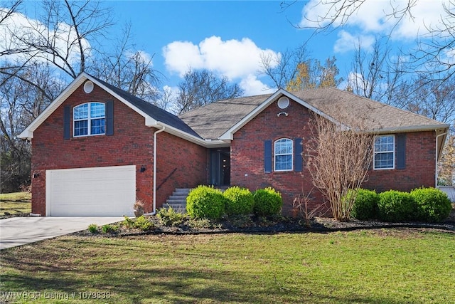 298 Bayou Rd, Fort Gibson, OK 74434 - ranch-style home with brick siding, driveway, a front lawn, and an attached garage