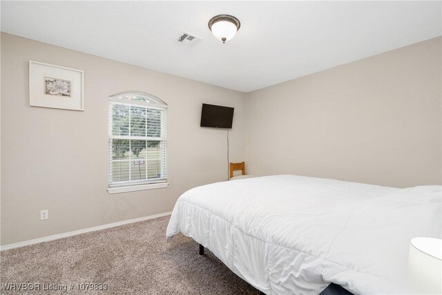 298 Bayou Rd, Fort Gibson, OK 74434 - bedroom with carpet floors, baseboards, and visible vents