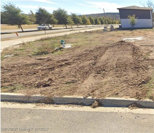 view of yard featuring a rural view