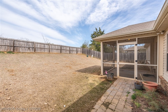 view of yard with a fenced backyard