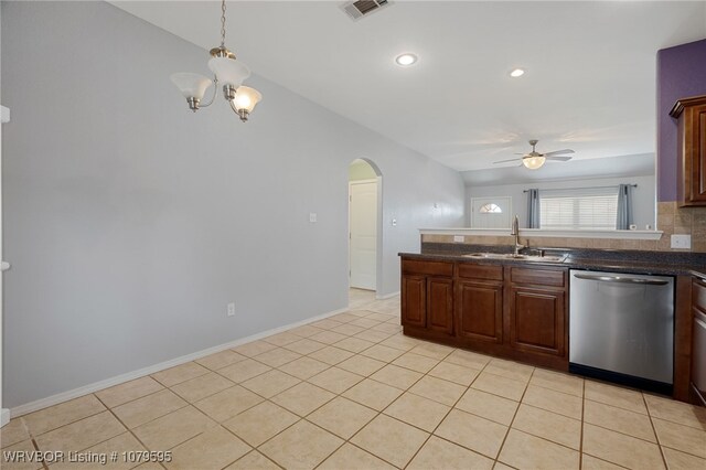 kitchen with visible vents, ceiling fan with notable chandelier, stainless steel dishwasher, arched walkways, and a sink