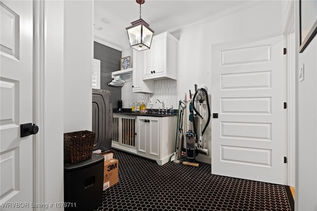 8801 Rombauer Pt, Fort Smith, AR 72916 - interior space featuring a sink, ornamental molding, and dark carpet