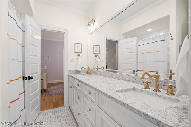 8801 Rombauer Pt, Fort Smith, AR 72916 - bathroom featuring double vanity, ornamental molding, tile patterned floors, and a sink