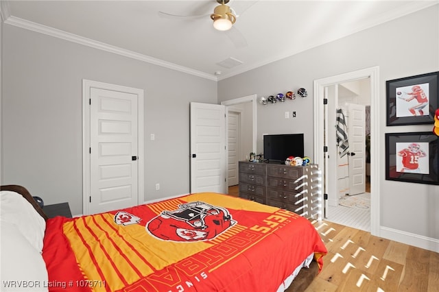 8801 Rombauer Pt, Fort Smith, AR 72916 - bedroom featuring baseboards, ornamental molding, ensuite bathroom, light wood-style floors, and a ceiling fan