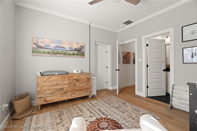8801 Rombauer Pt, Fort Smith, AR 72916 - bedroom featuring crown molding, wood finished floors, visible vents, and baseboards