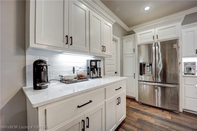 2803 Turtle Creek Dr, Lavaca, AR 72941 - kitchen featuring stainless steel fridge, white cabinets, backsplash, dark wood-style flooring, and crown molding