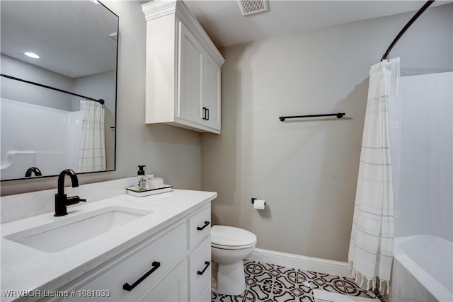 2803 Turtle Creek Dr, Lavaca, AR 72941 - bathroom featuring vanity, baseboards, toilet, tile patterned flooring, and shower / bath combo with shower curtain