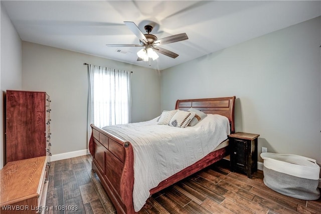 2803 Turtle Creek Dr, Lavaca, AR 72941 - bedroom with dark wood-style flooring, baseboards, and a ceiling fan
